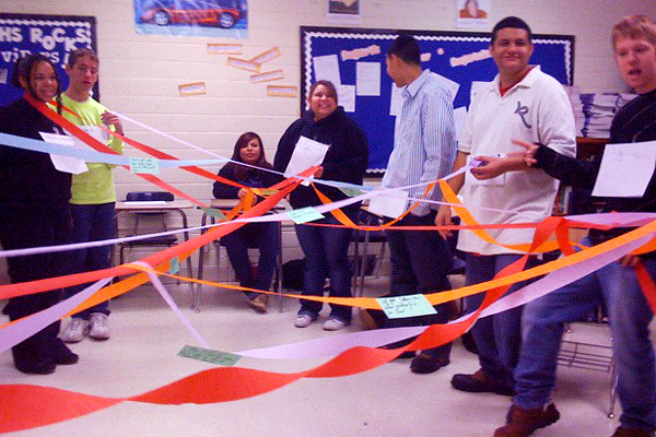 Students playing with a Compliment Web